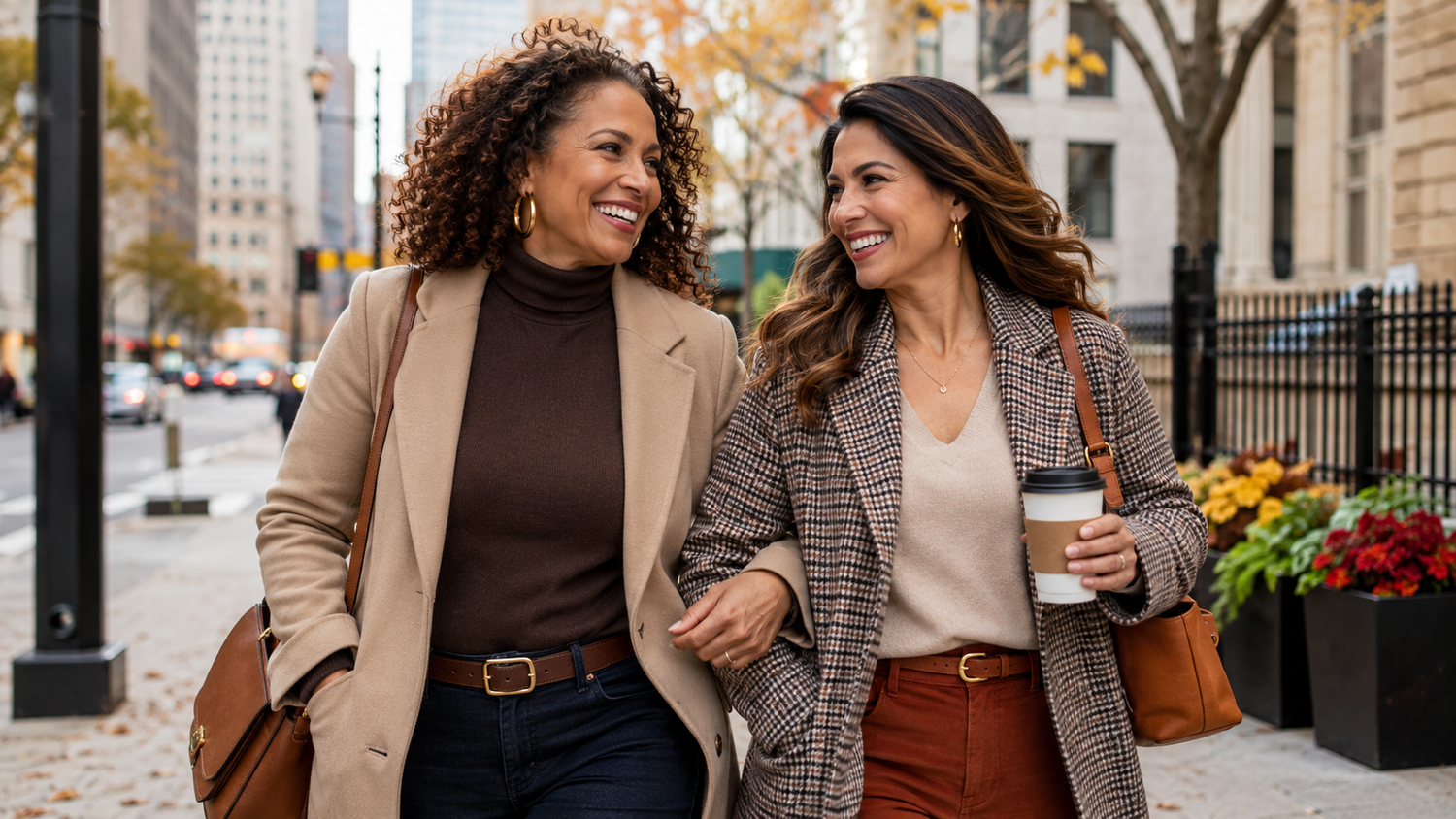 2 women smilling on the street